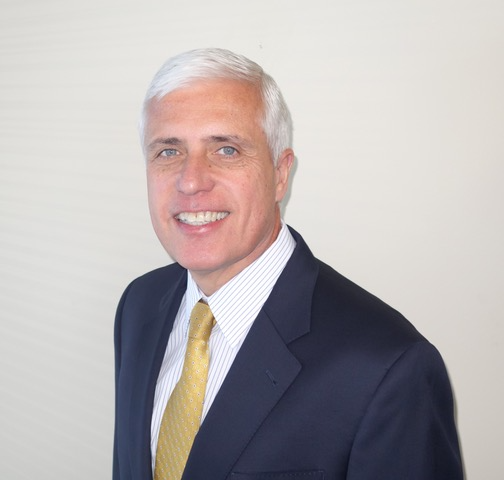 Gene Needles headshot.png